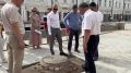 На Арбате завершают заливку основания фонтана